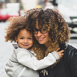 woman and child in street